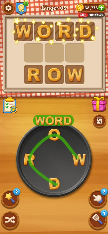 Word Cookies screenshot showing a pan of letter cookies being swiped to spell the word WORD